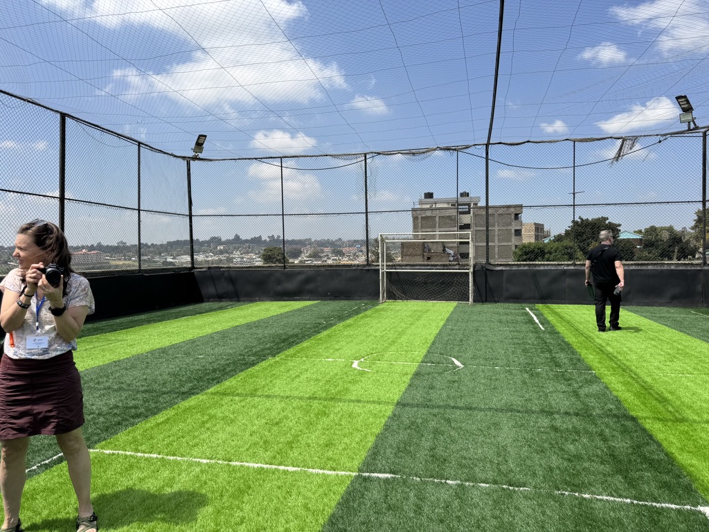 The rooftop turf sports pitch at KGSA overlooking Nairobi