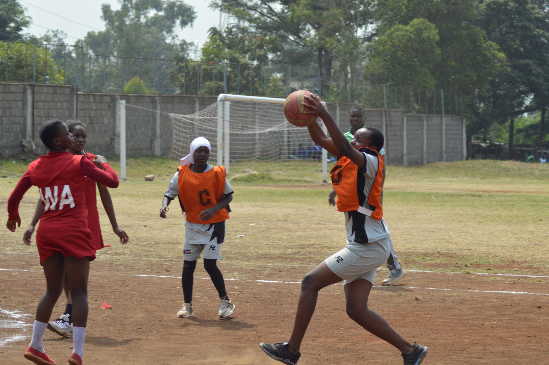 KGSA students playing netball on the school field