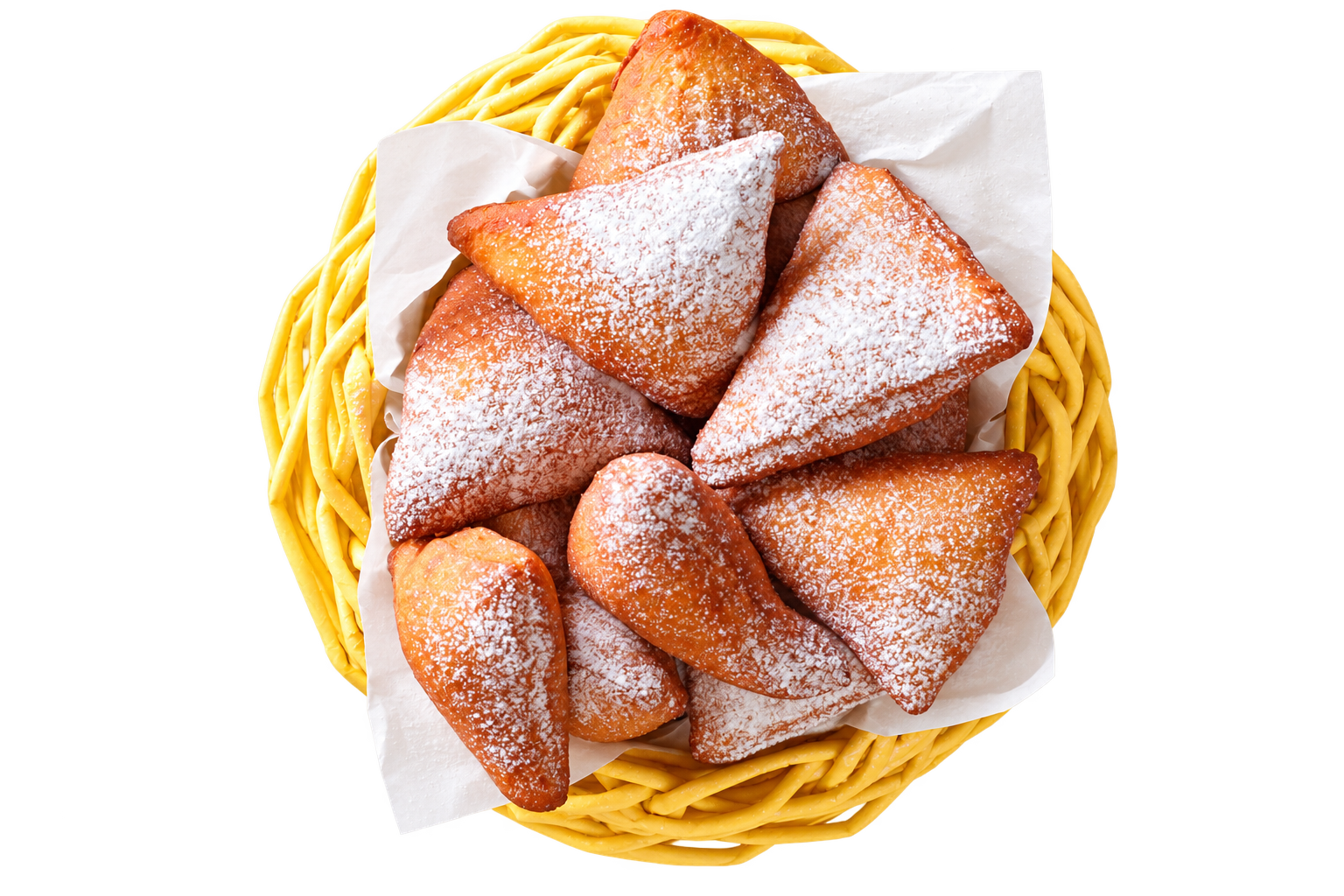 Basket of golden mandazi dusted with sugar